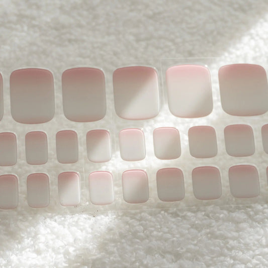 Enhance your pedicure with our Soft Pink Gradient Semicured DIY gel nail sticker. Achieve a flawless gradient effect for stunning toes.