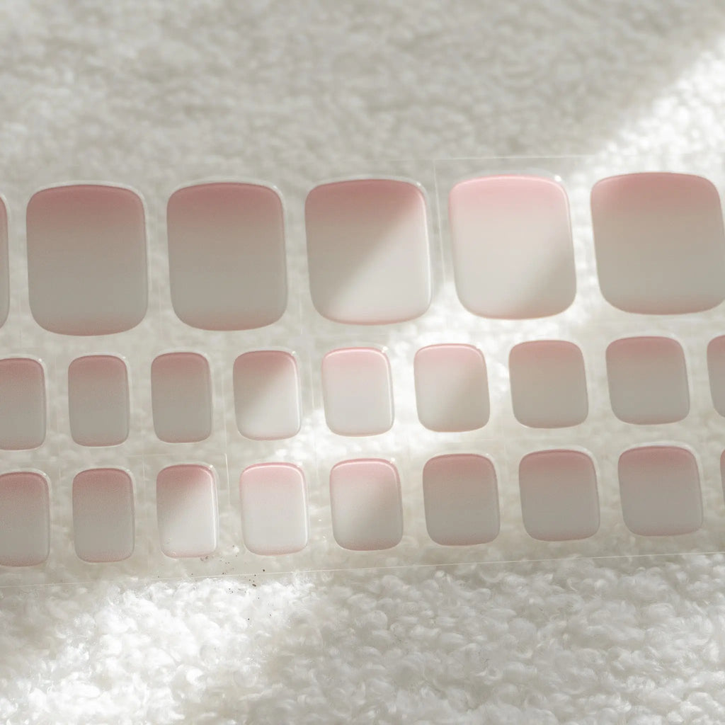 Enhance your pedicure with our Soft Pink Gradient Semicured DIY gel nail sticker. Achieve a flawless gradient effect for stunning toes.